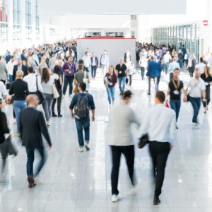 blurred people at a trade fair