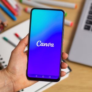 Kyiv, Ukraine - Mar. 20th, 2023: Canva logo on the screen of a mobile phone in hand.